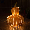 Gourd Luminary lit up with streaks of light
