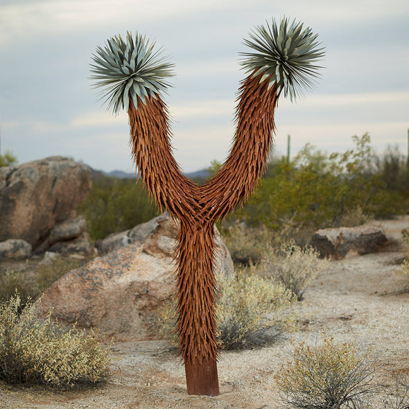 Steel Joshua Tree with desert background