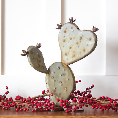 Prickly Pear Heart sculpture on table top