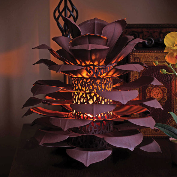 Pine Cone Luminary lit up in interior scene