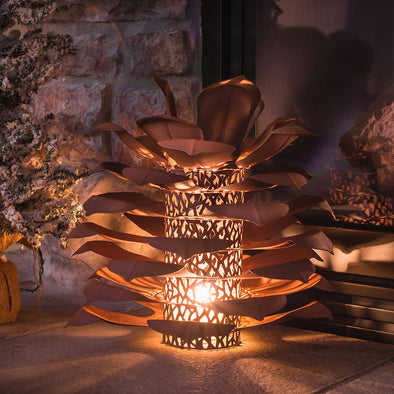 Pine Cone Luminary lit up in interior scene